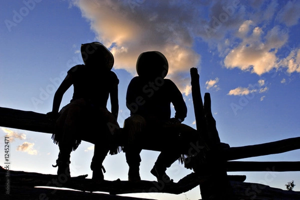 Obraz Silhouetted Cowboys