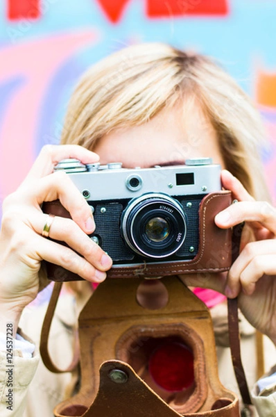 Fototapeta Girl with retro camera