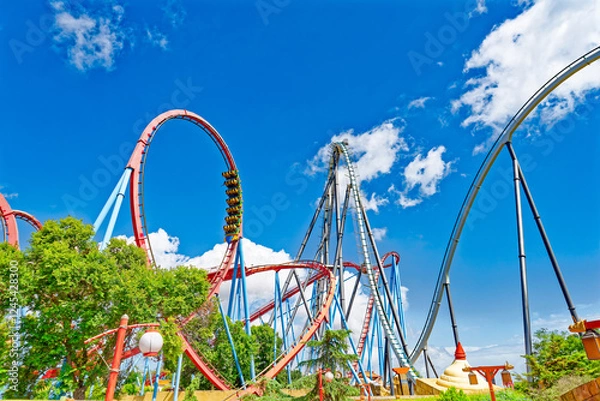 Obraz Roller Coaster in funny amusement park.