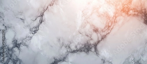 Fototapeta Marble texture background with soft white and gray tones, subtle veining, and warm light accents in the top right corner creating a serene ambiance.