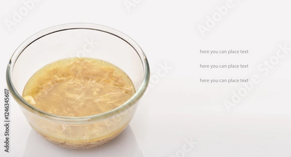 Fototapeta Advertising poster with space for text. Round glassware with galantine on white background, space for text