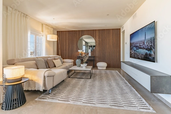 Obraz an image of a luxury living room area with sofa and television in mediterranean apartment real estate 