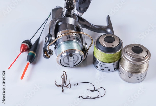 Fototapeta reel, fishing lines, hooks and floats