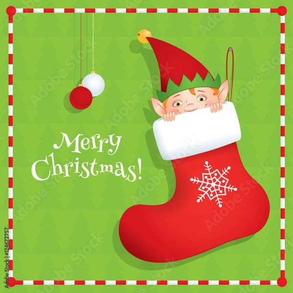 Obraz Vector cartoon illustration of a cute elf hiding in a red Christmas stocking. Holiday greeting card with text "Merry Christmas". Green background, square format.
