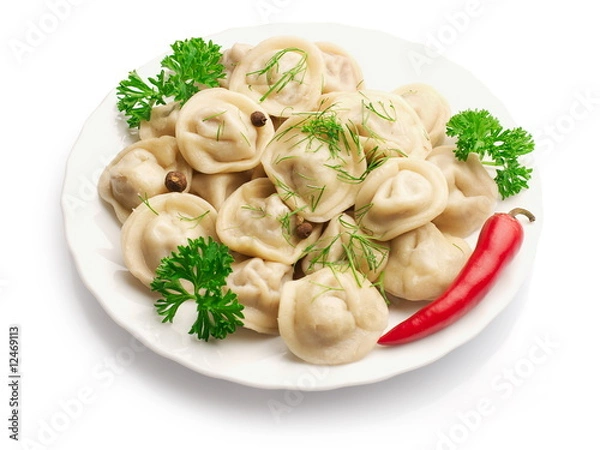 Obraz Boiled Ravioli with red pepper over white background