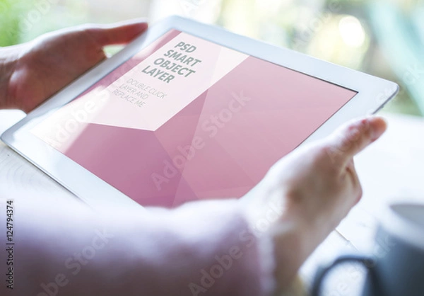 Fototapeta User with Tablet on Wooden Table in Soft Focus 3