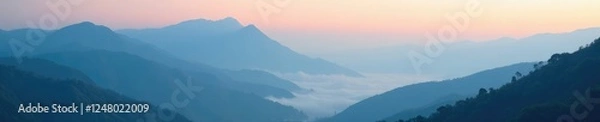 Obraz Misty veil rising from the valleys and hills of a mountain range, hills, atmosphere