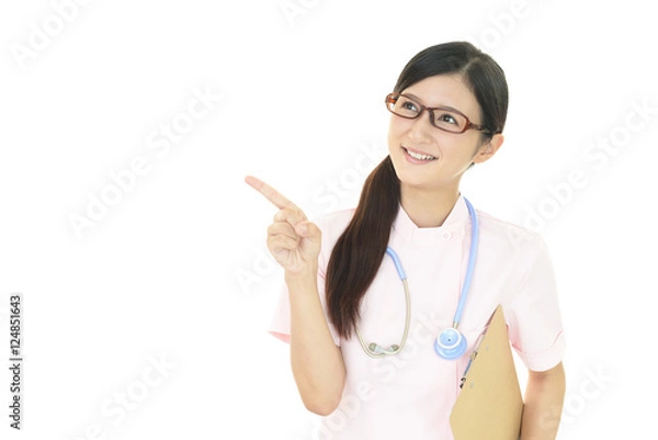 Fototapeta 指示する笑顔の看護師