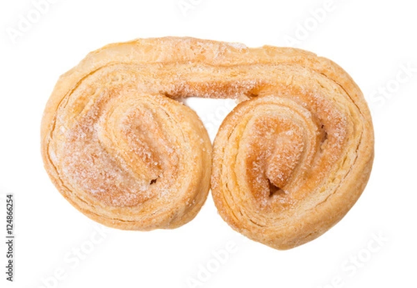 Fototapeta Rolled puff biscuit with sugar.