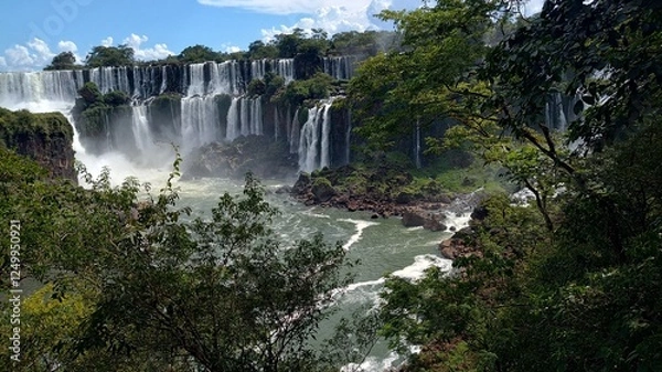 Fototapeta Explore the Vast Panoramic Expanse of Iguazu Falls in Argentina, Where Every Detail Tells a Story of Timeless Natural Brilliance and Wonder
