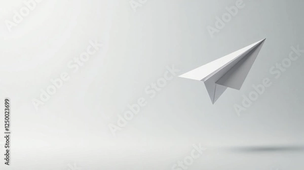 Fototapeta A Simple White Paper Airplane in Flight, Soaring Through a Neutral Background, Representing Dreams of Travel and Freedom