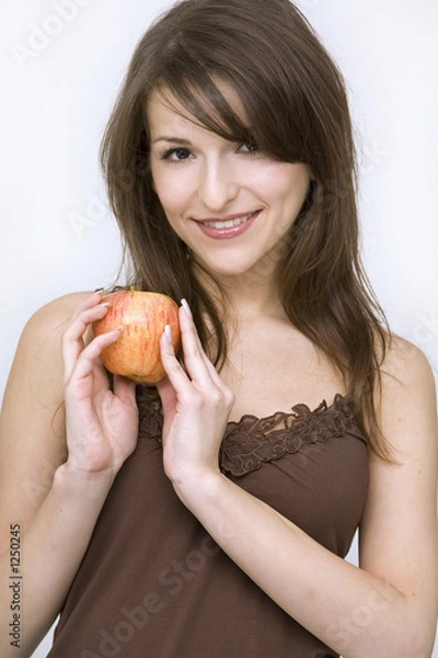 Fototapeta girl posing with red apple