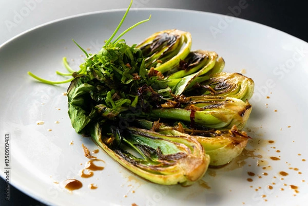 Obraz Fresh bok choy is elegantly plated, showcasing a vibrant green garnish inspired by Asian cuisine.