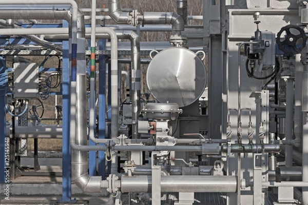 Obraz Details of a modern natural gas processing plant with pressure dials on gasworks pipes