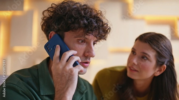 Fototapeta Office workers worried call working together on modern workplace closeup. 