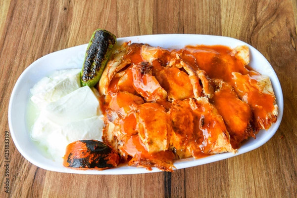 Fototapeta Lavash zurna doner kebab ( zurna  durum )  or shawarma sliced in plate isolated.  hatay usulu tavuk Et doner durum. Gobit ekmek arasi doner. Pilavustu iskender doner kebap. 