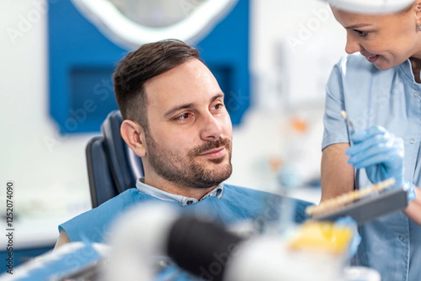 Fototapeta Patient and Dentist Discussing Treatment in Modern Dental Office