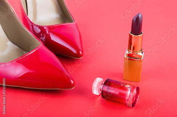 Obraz gradient classical shoes and pomade on a red background