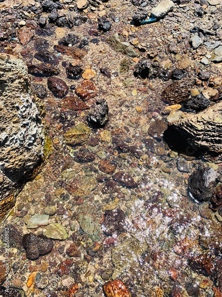 Fototapeta Close-up view of rocks in the sea