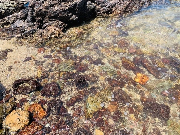 Fototapeta Close-up view of rocks in the sea