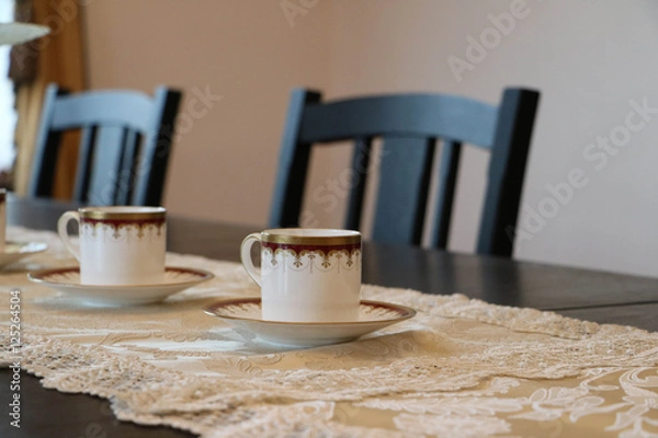 Fototapeta Coffee cup on the table / テーブルの上のコーヒーカ