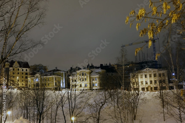 Fototapeta Night and building on the street of the city
