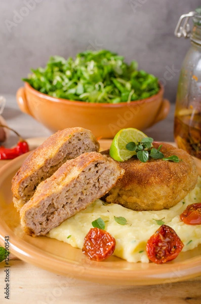 Obraz Minced meat schnitzel with cheese