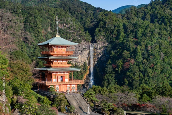 Fototapeta Three-storied pagoda with Nachi Falls in the background, Wakayama Prefecture, Japan