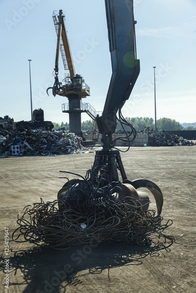 Obraz Large excavators work on scrap metal