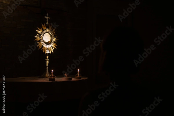 Obraz Adoration of the Blessed Sacrament at night in a community chapel in Medjugorje.