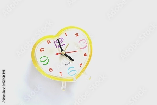 Fototapeta Alarm Clock on a white background