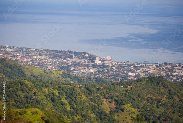 Fototapeta A beautiful view of Dili, the capital of East Timor, seen from a hill on the outskirts of the city. 