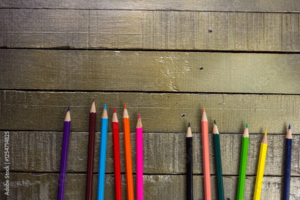 Obraz Top view of color pencils with space for text