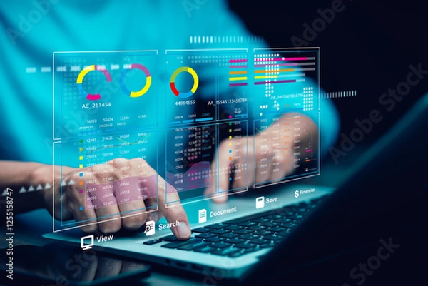 Obraz Data analytics and financial technology concept.A person working on a laptop with futuristic digital graphs, charts, and statistics, representing big data, business intelligence,digital transformation