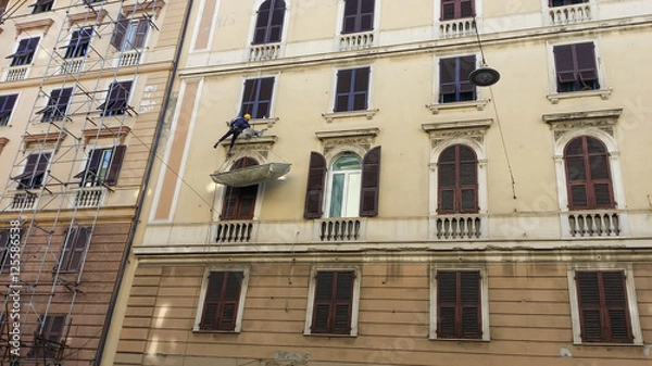 Obraz Worker hanging on rope