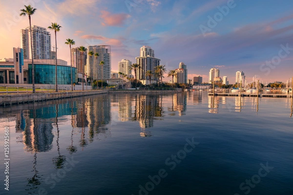 Obraz St. Petersburg, Florida, USA. Cityscape image of St. Petersburg, Florida with reflection of the city skyline in the water at beautiful sunset.