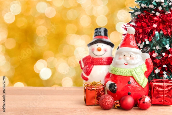 Fototapeta Santa claus and snowman for christmas day