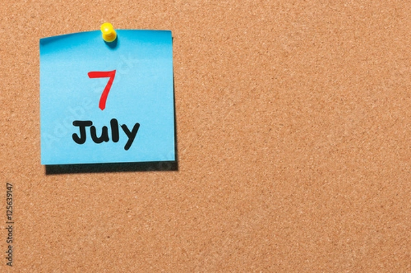 Fototapeta July 7th. Day 7 of month, color sticker calendar on notice board. Summer time. Empty space for text