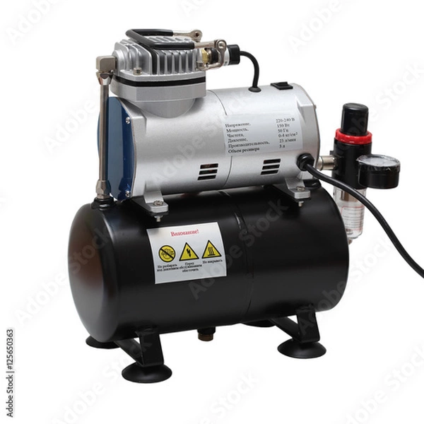 Obraz Portable car air compressor. Compressor on white background