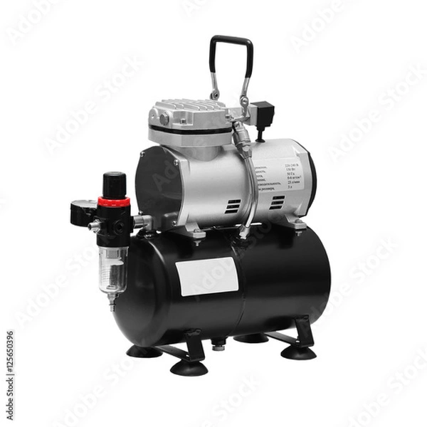 Obraz Portable car air compressor. Compressor on white background