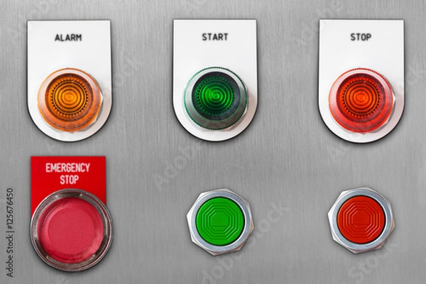 Fototapeta Push button switch with emergency stop and start stop alarm lamp signal on stainless steel panel wit clipping path
