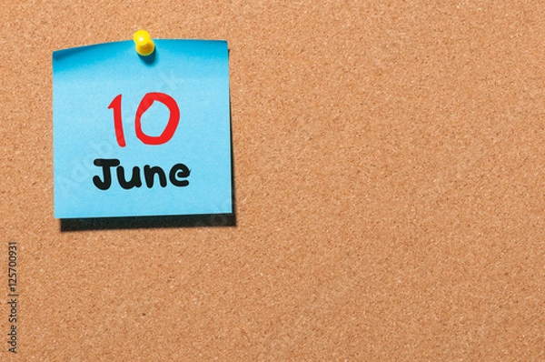 Fototapeta June 10th. Day 10 of month, color sticker calendar on notice board. Summer time. Empty space for text