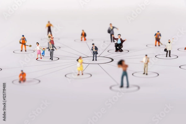 Obraz close up of miniature people with social network diagram
