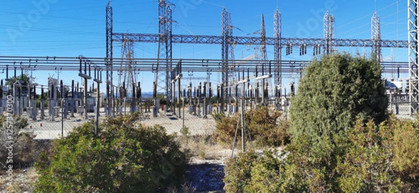 Obraz View of a large electrical substation, highlighting the complexity of its cables and structures