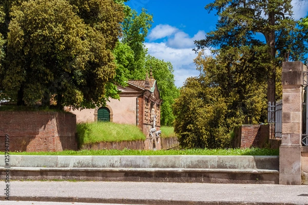Fototapeta Renaissance Porta San Pietro (St Peter's Gate) erected in 1565, one of the main entrace in Lucca ancient city walls, with ancient stone lions