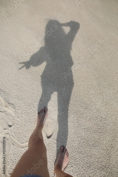 Obraz A woman's shadow on the beach
