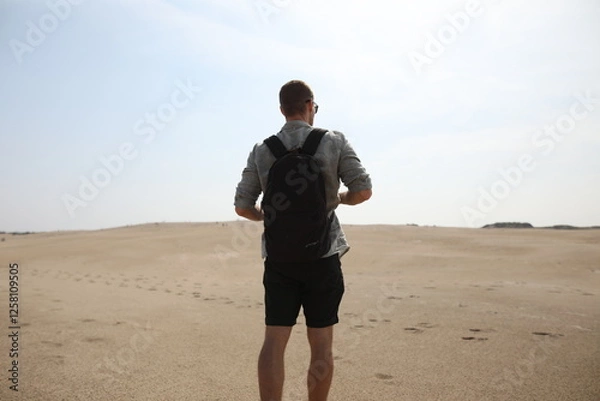 Obraz Young man in desert