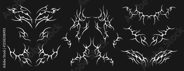 Fototapeta Vector set of neo tribal tattoo. Neotribal gothic butterfly with wings, flame, heart, womb, symmetrical abstract dividers. Cyber sigilism y2k design elements. Celtic gothic body ornaments, emo sticker