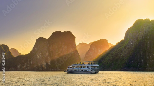 Obraz Dreamy sunset among the rocks of Halong Bay, Vietnam