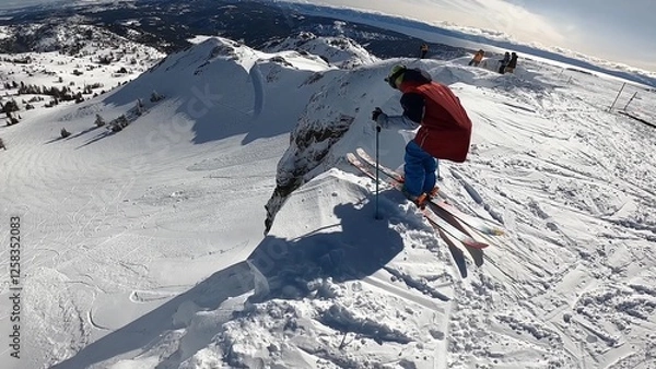 Obraz Winter Sports Enthusiast Descending A Snow-covered Ski Slope Amid Picturesque Mountain Scenery